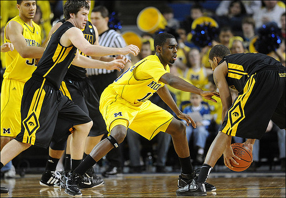 Jordan Morgan (52) and Tim Hardaway Jr. (10)