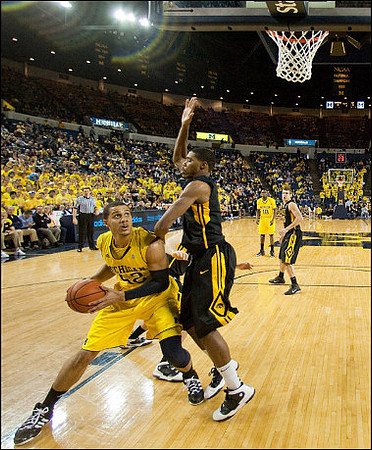 Jordan Morgan (52) and Tim Hardaway Jr. (10)