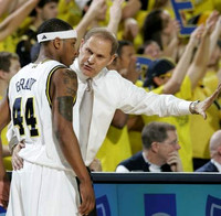 Kelvin Grady (44) and John Beilein