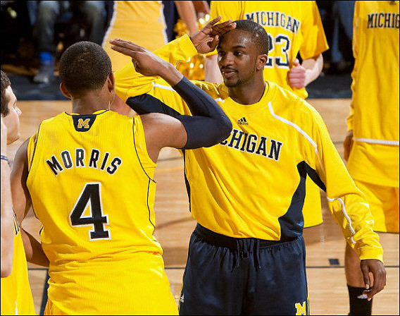 Darius Morris (4) and Corey Person (32)
