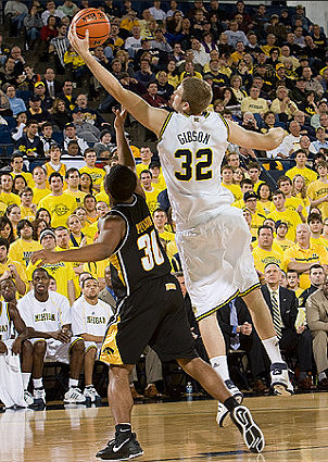 Zack Gibson (32), DeShawn Sims (34), and David Merritt (15)