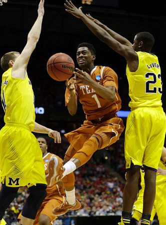 Nik Stauskas (11) and Caris LeVert (23)