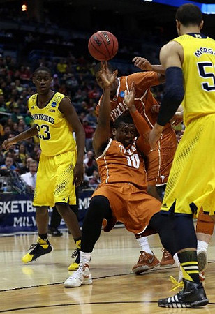 Caris LeVert (23) and Jordan Morgan (52)
