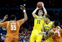Nik Stauskas (11) and Jordan Morgan (52)
