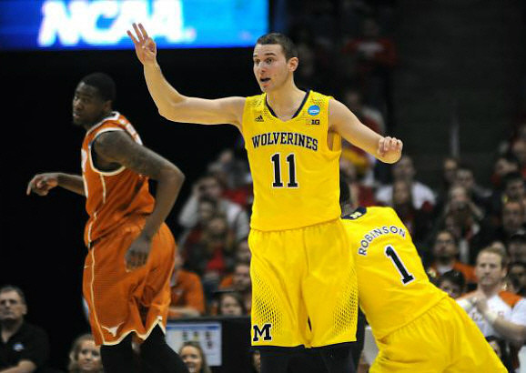 Nik Stauskas (11) and Glenn Robinson III (1)