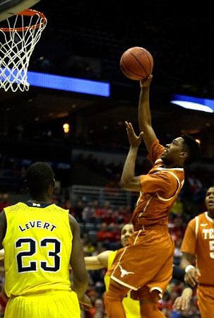 Caris LeVert (23) and Jordan Morgan (52)