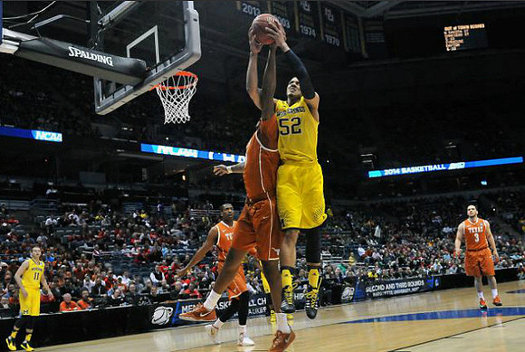 Nik Stauskas (11) and Jordan Morgan (52)