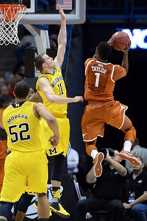 Jordan Morgan (52) and Nik Stauskas (11)