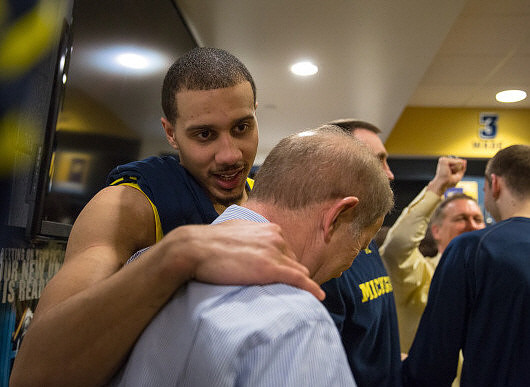 Jordan Morgan (52) and John Beilein
