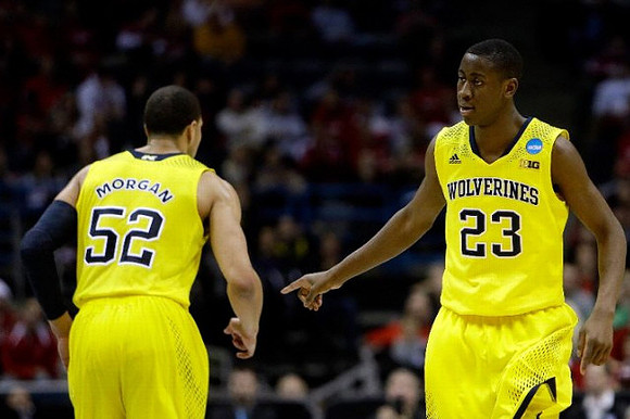 Jordan Morgan (52) and Caris LeVert (23)