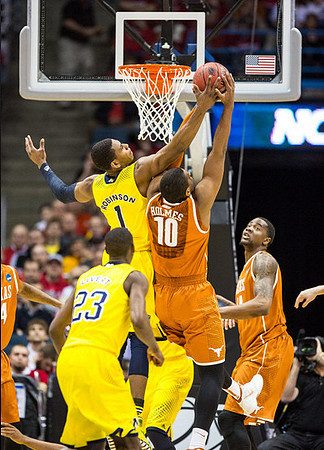 Caris LeVert (23) and Glenn Robinson III (1)
