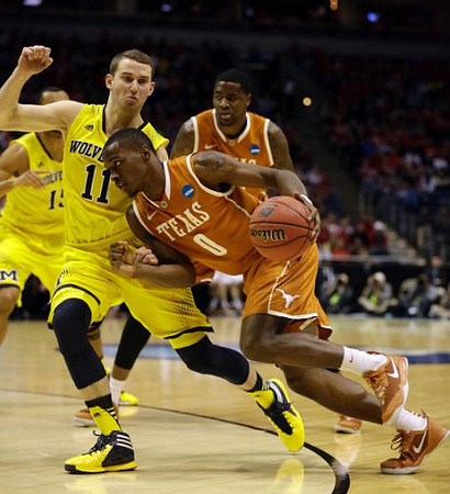Nik Stauskas (11) and Jon Horford (15)