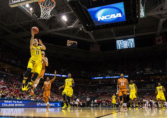 Nik Stauskas (11), Glenn Robinson III (1), Jordan Morgan (52), Caris LeVert (23), and Derrick Walton Jr. (10)