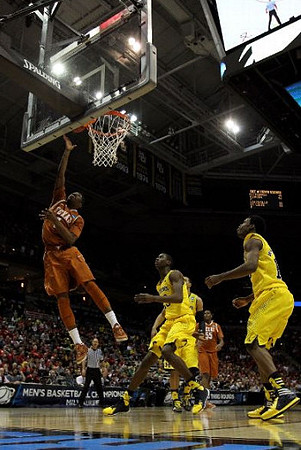 Caris LeVert (23) and Derrick Walton Jr. (10)