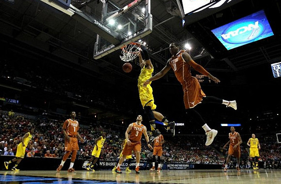 Glenn Robinson III (1), Jordan Morgan (52), Caris LeVert (23), and Nik Stauskas (11)
