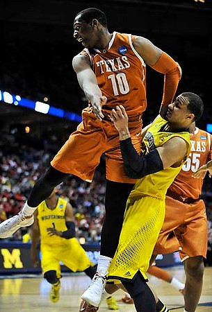 Glenn Robinson III (1) and Jordan Morgan (52)