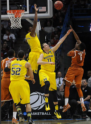 Jordan Morgan (52), Glenn Robinson III (1), and Nik Stauskas (11)