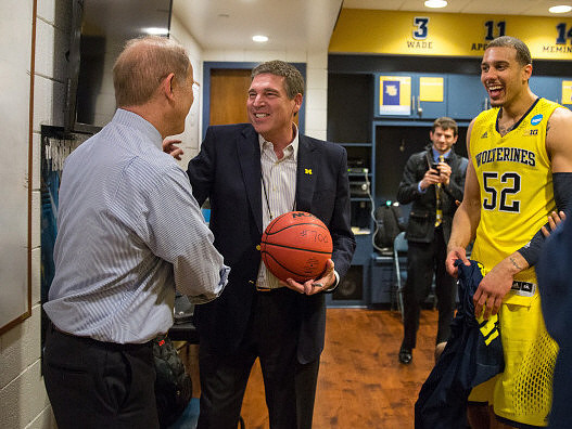 John Beilein, David Brandon, and Jordan Morgan (52)