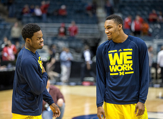 Derrick Walton Jr. (10) and Zak Irvin (21)