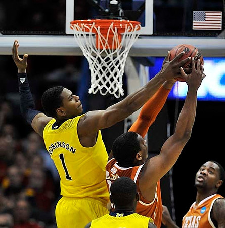 Glenn Robinson III (1) and Caris LeVert (23)