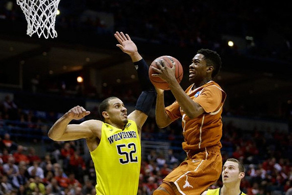 Jordan Morgan (52) and Nik Stauskas (11)
