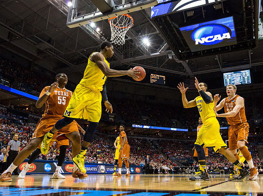 Glenn Robinson III (1) and Jordan Morgan (52)