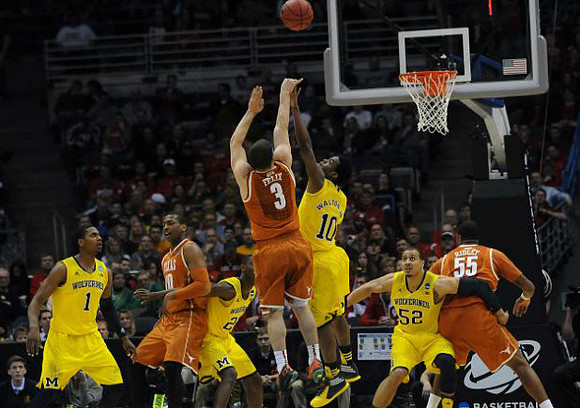 Glenn Robinson III (1), Caris LeVert (23), Derrick Walton Jr. (10), and Jordan Morgan (52)
