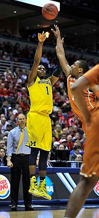 Glenn Robinson III (1) and John Beilein