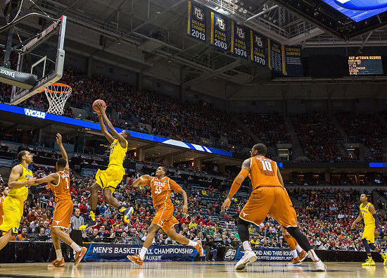 Jordan Morgan (52), Caris LeVert (23), and Glenn Robinson III (1),