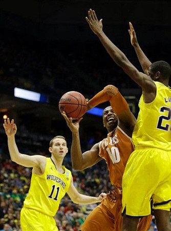 Nik Stauskas (11) and Caris LeVert (23)