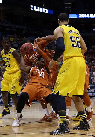 Caris LeVert (23) and Jordan Morgan (52)
