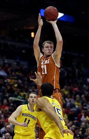 Nik Stauskas (11) and Jon Horford (15)