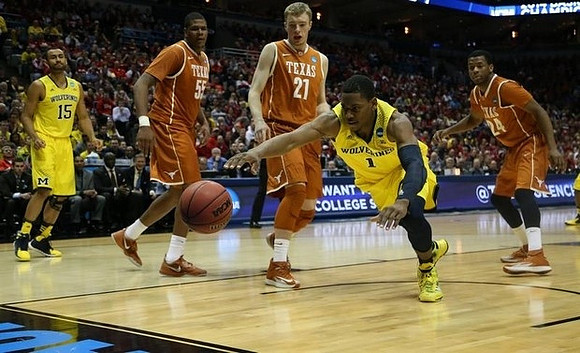 Jon Horford (15) and Glenn Robinson III (1)