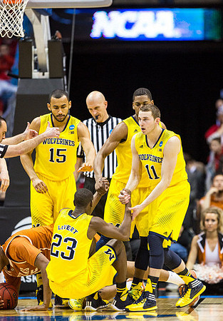 Jon Horford (15), Caris LeVert (23), Glenn Robinson III (1), and Nik Stauskas (11)