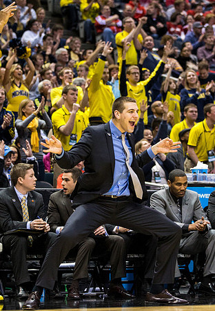 Mitch McGary (4) and LaVall Jordan