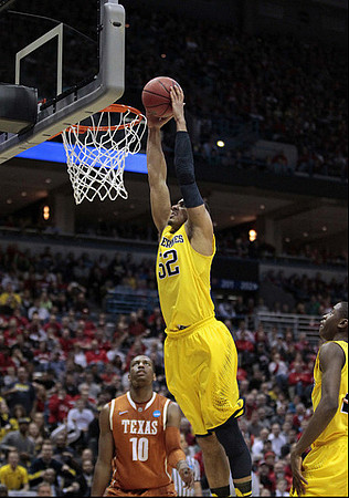 Jordan Morgan (52) and Caris LeVert (23)