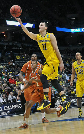 Nik Stauskas (11) and Jordan Morgan (52)