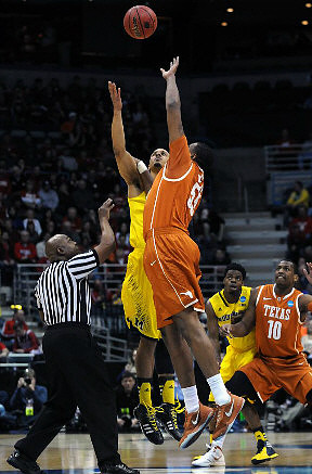 Jordan Morgan (52) and Derrick Walton Jr. (10)