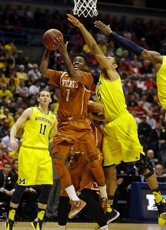 Nik Stauskas (11) and Jon Horford (15)