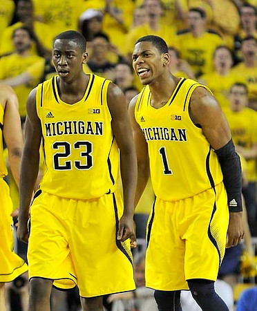 Caris LeVert (23) and Glenn Robinson III (1)