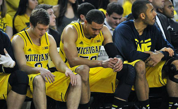 Spike Albrecht (2), Jordan Morgan (52), and Jon Horford (15)