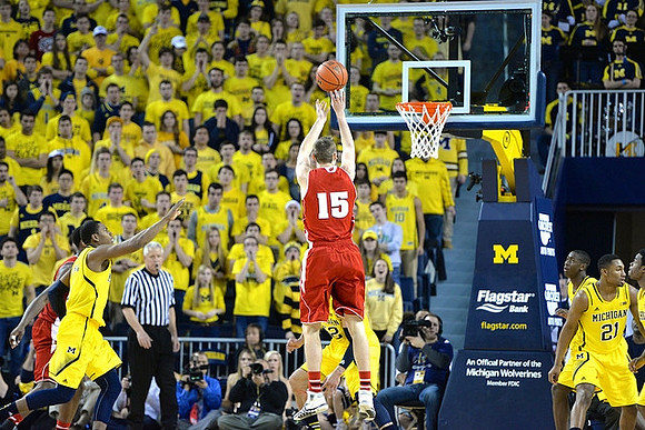 Glenn Robinson III (1), Spike Albrecht (2), Caris LeVert (23), and Zak Irvin (21)