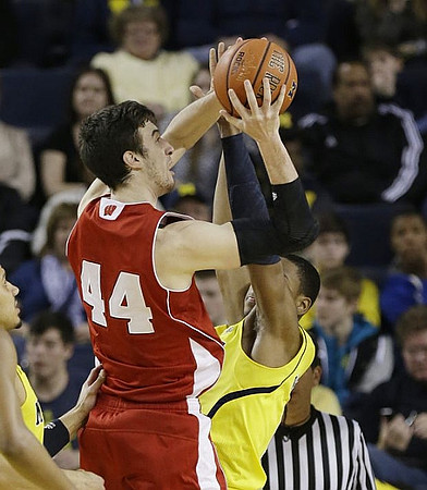 Jordan Morgan (52) and Glenn Robinson III (1)