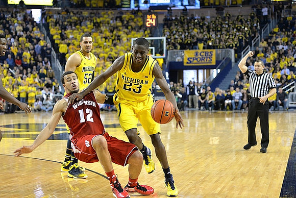 Jordan Morgan (52) and Caris LeVert (23)