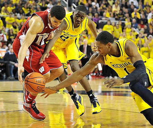 Caris LeVert (23) and Glenn Robinson III (1)