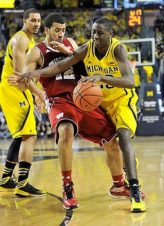 Jordan Morgan (52) and Caris LeVert (23)