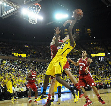 Caris LeVert (23) and Glenn Robinson III (1)