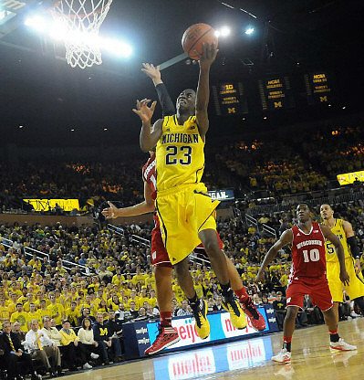 Caris LeVert (23) and Jordan Morgan (52)