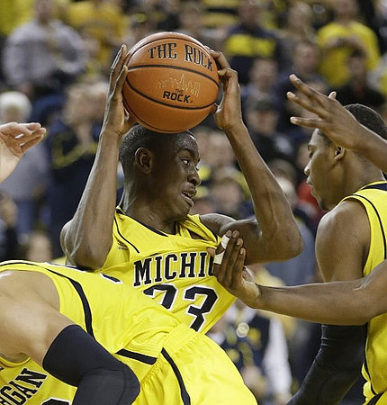 Caris LeVert (23) and Glenn Robinson III (1)