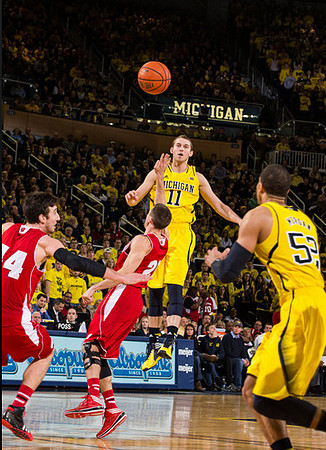 Nik Stauskas (11) and Jordan Morgan (52)
